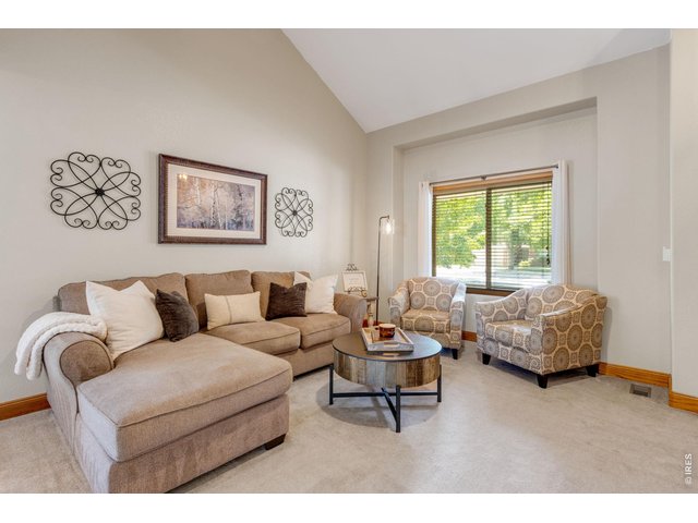 Property Photo 7 Cozy sitting room with solid wood trim throughout.