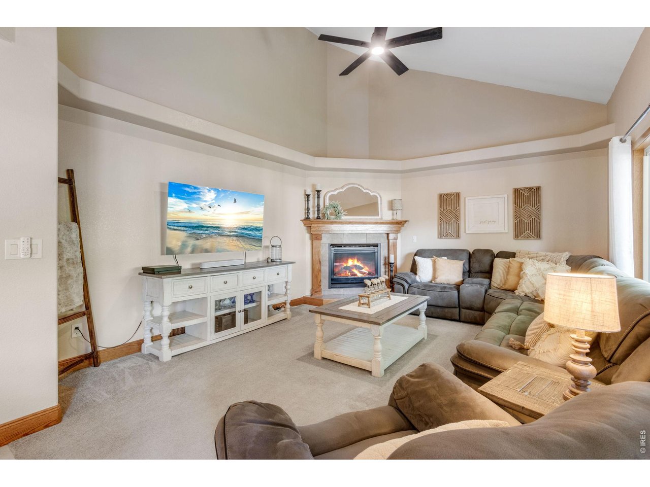 Property Photo 13 Vaulted ceilings and bright living room!