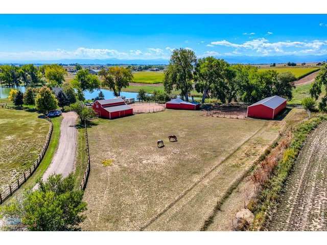 Property Photo 4 Fenced pastures and thoughtfully arranged equestrian improvements complement the ranch setting.