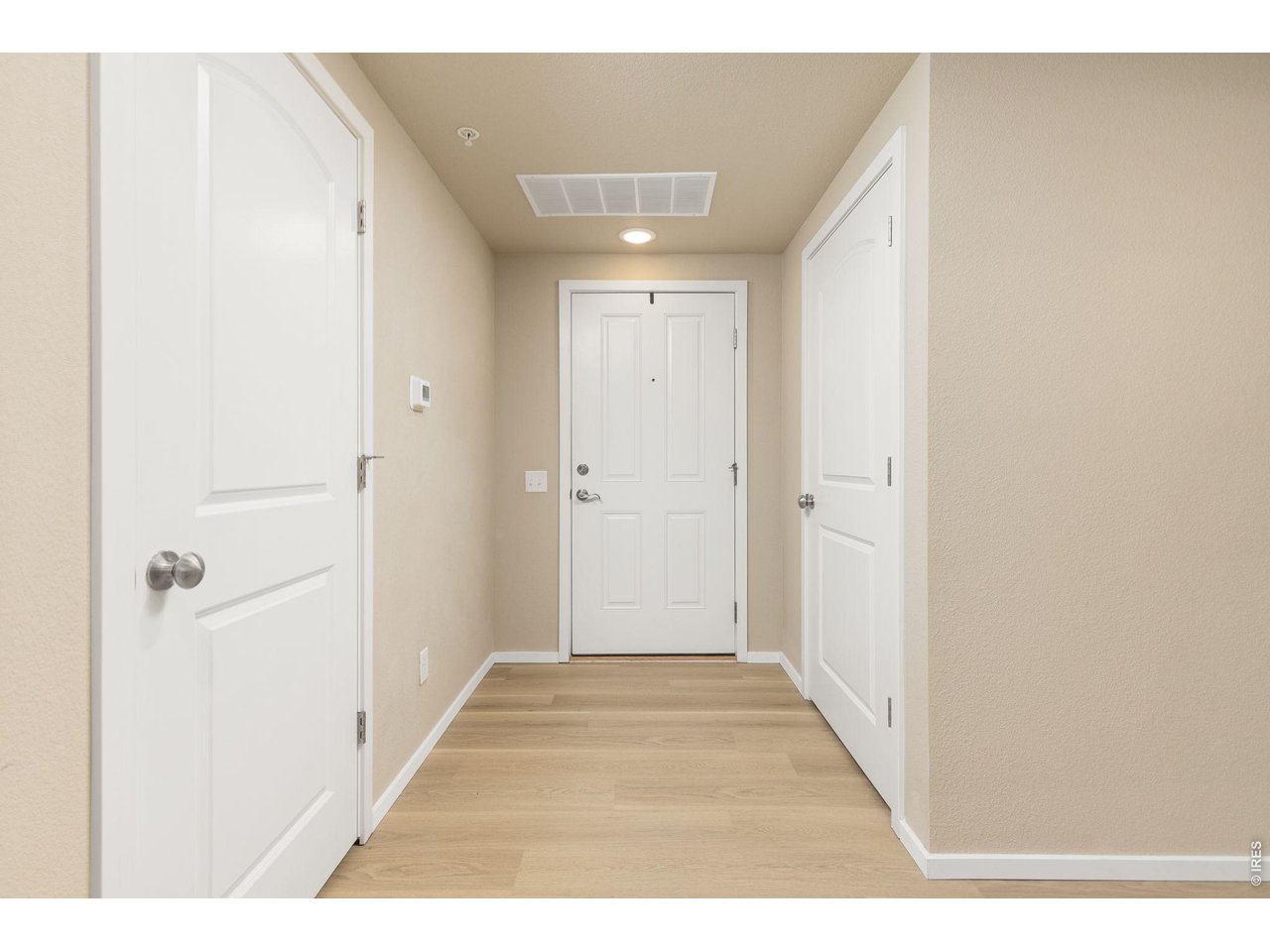 Property Photo 15 Entryway and Brand New DreamWeaver LVP Throughout Home