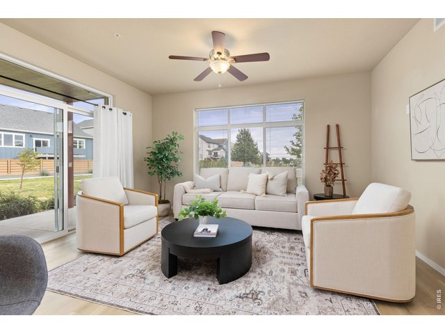 Property Photo 2 Main Living Area with Abundant Natural Light