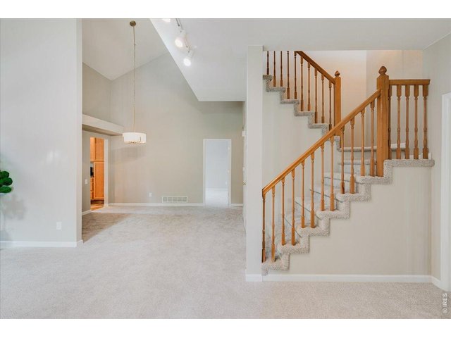 Property Photo 15 dining and stairs to loft