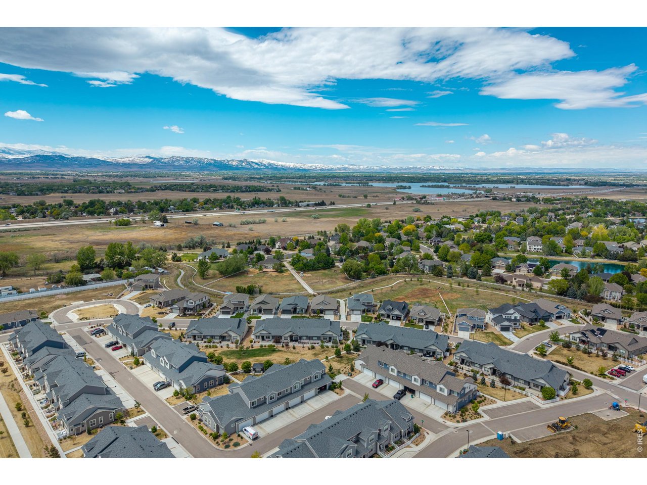 Property Photo 46 Aerial view showcasing proximity to open space, trails, and surrounding neighborhood.