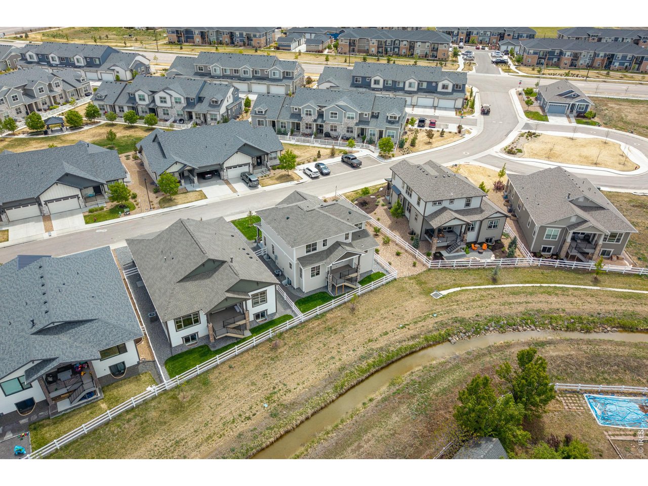Property Photo 45 Bird's-eye view capturing the neighborhood layout and nearby walking paths.