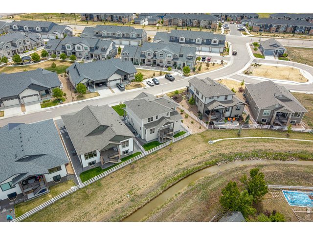 Property Photo 45 Bird's-eye view capturing the neighborhood layout and nearby walking paths.