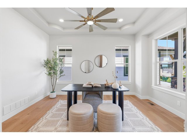 Property Photo 13 A thoughtfully designed main-level flex space that easily adapts-ideal for a home office, formal dining, or a space that evolves with you.