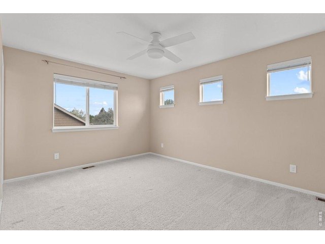 Property Photo 28 Upstairs bedroom w/ en suite bath