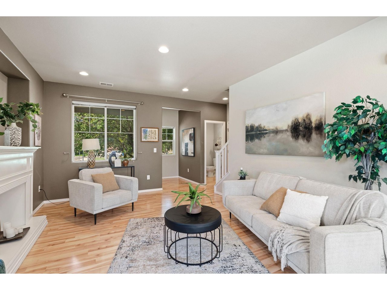 Property Photo 7 Inviting main level with low-maintenance laminate flooring!