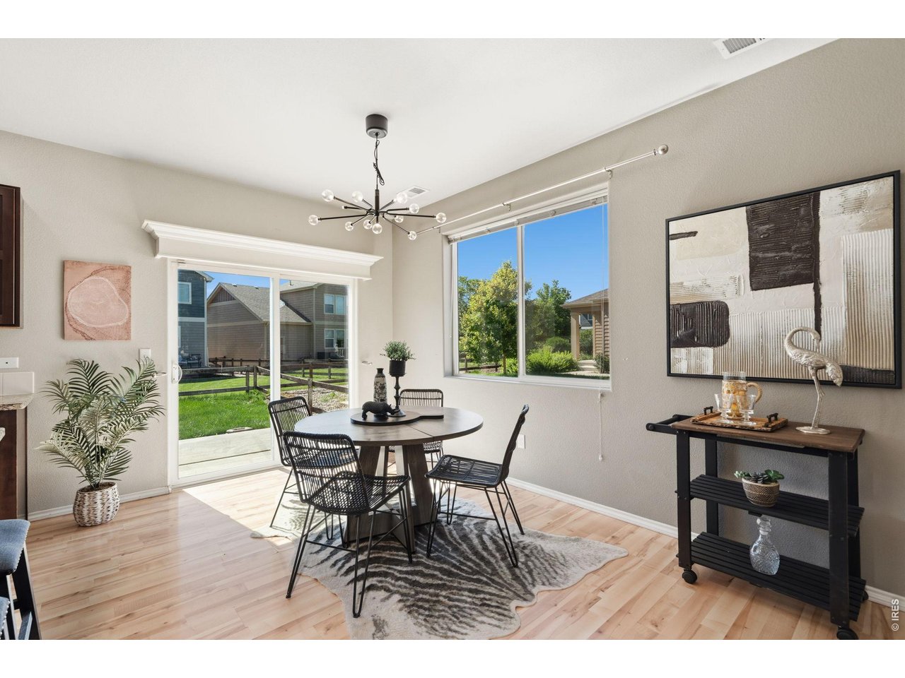 Property Photo 15 Separate dining space with sliding doors out to the back patio.
