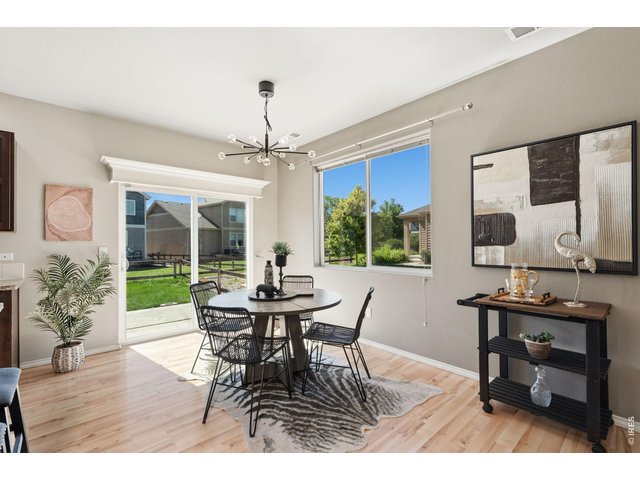 Property Photo 15 Separate dining space with sliding doors out to the back patio.