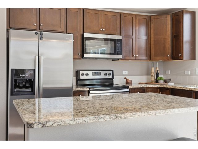 Property Photo 3 Stainless steel appliances - all appliances included.