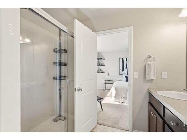 Property Photo 23 Master bath boasts a large walk-in shower.