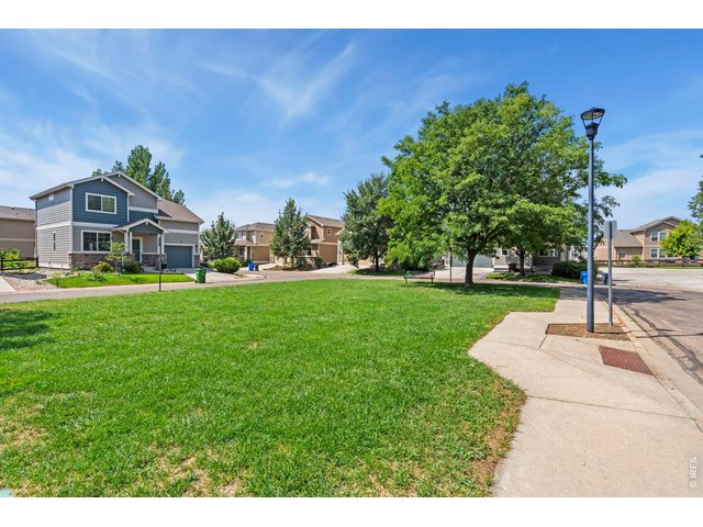 Property Photo 45 Enjoy the inviting green space located just steps from the front door.