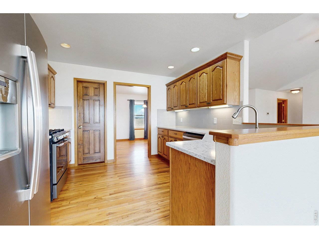 Property Photo 38 Kitchen - Wood Floors