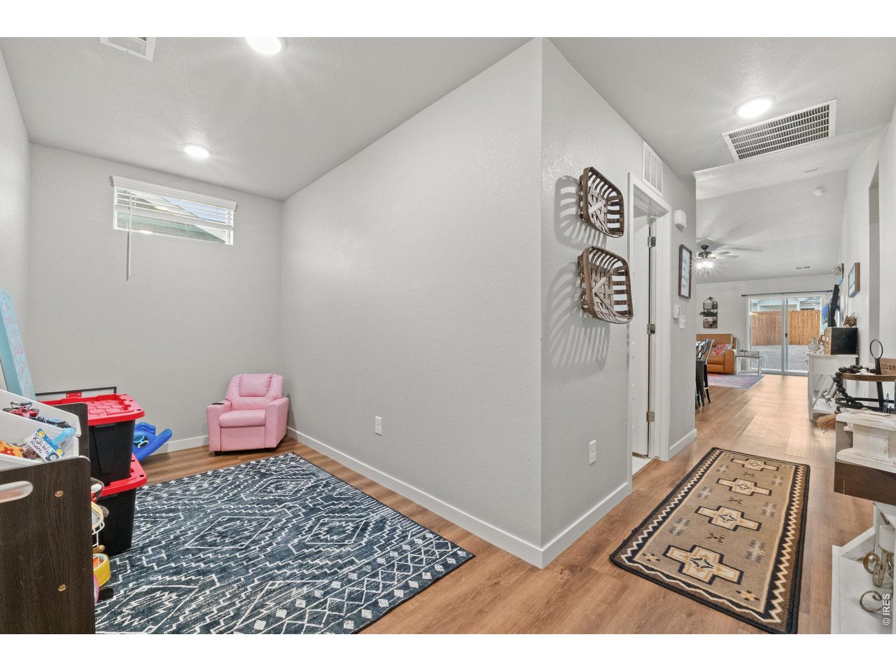 Property Photo 32 Bonus Space. Would make a great home office or play room. (Right inside the front door)