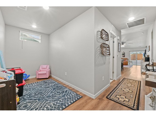Property Photo 32 Bonus Space. Would make a great home office or play room. (Right inside the front door)