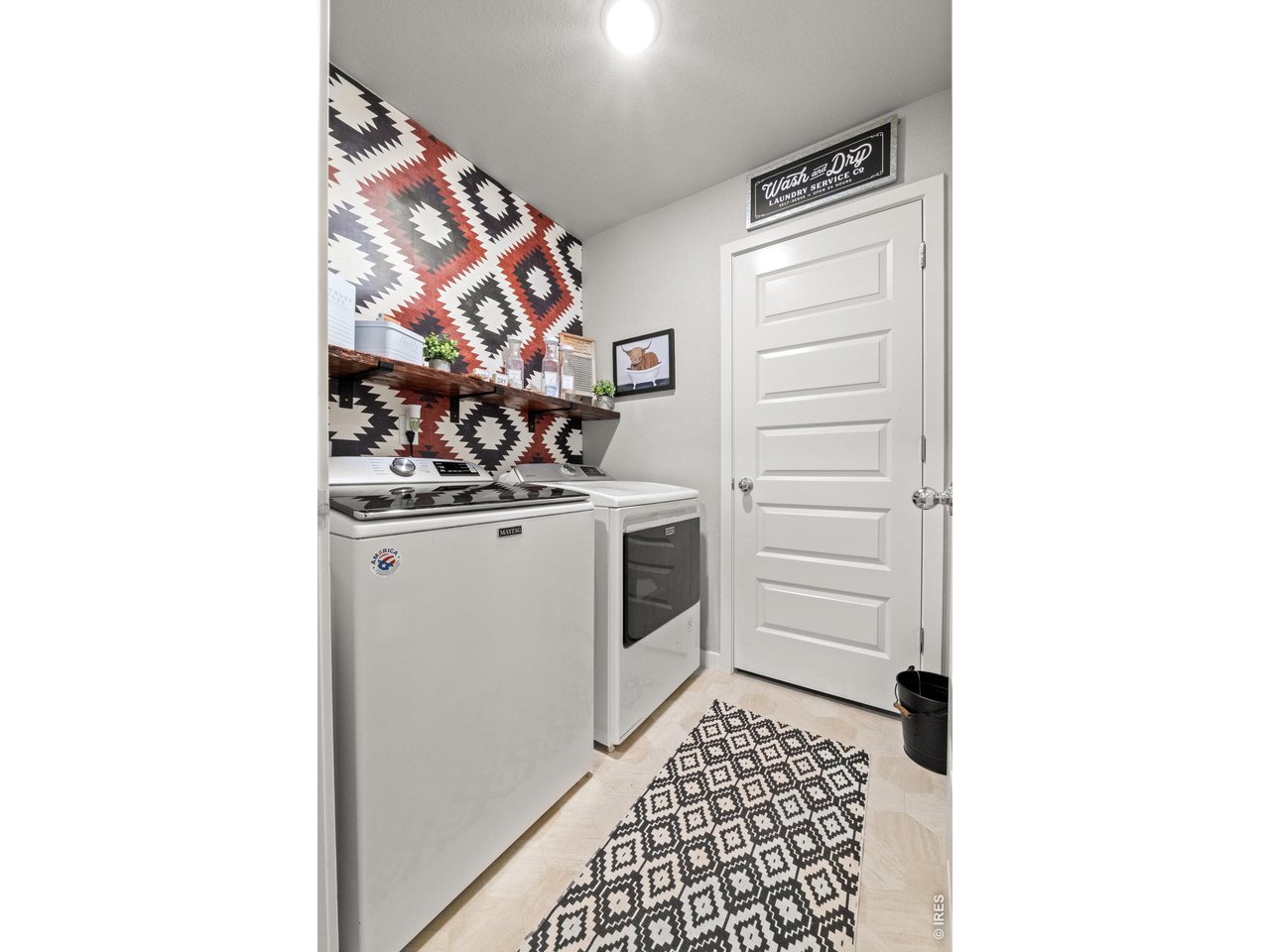 Property Photo 34 Laundry room with storage closet.