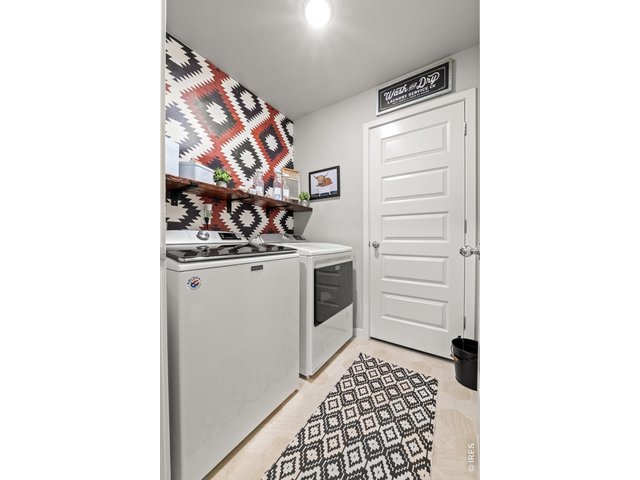 Property Photo 34 Laundry room with storage closet.