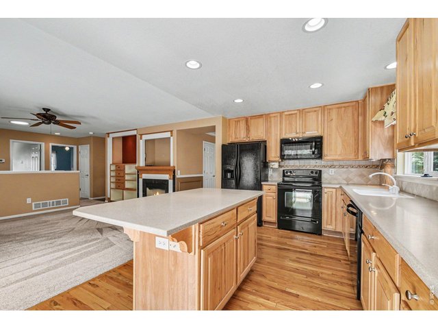 Property Photo 11 Open Kitchen with Generous Island