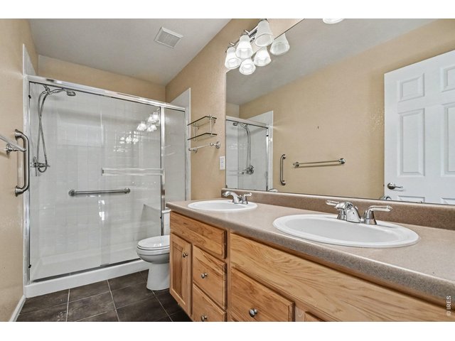 Property Photo 15 Primary Bathroom with Dual Sinks