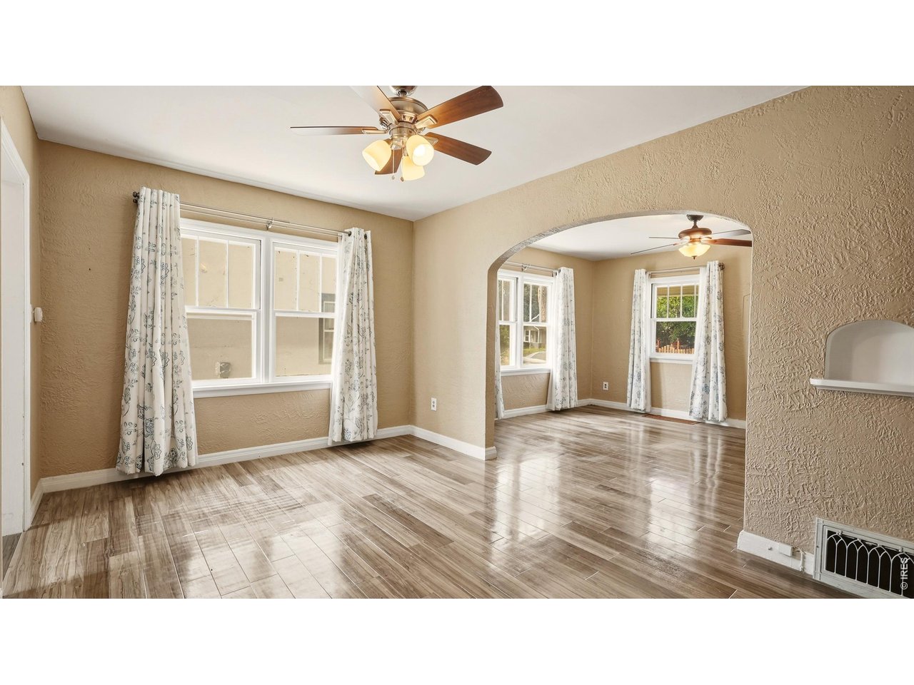 Property Photo 6 Dining area with large windows and easy access to the kitchen.