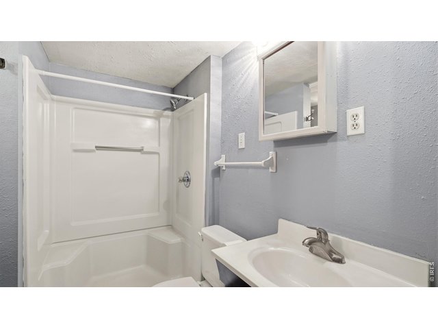 Property Photo 19 Basement bathroom with shower.