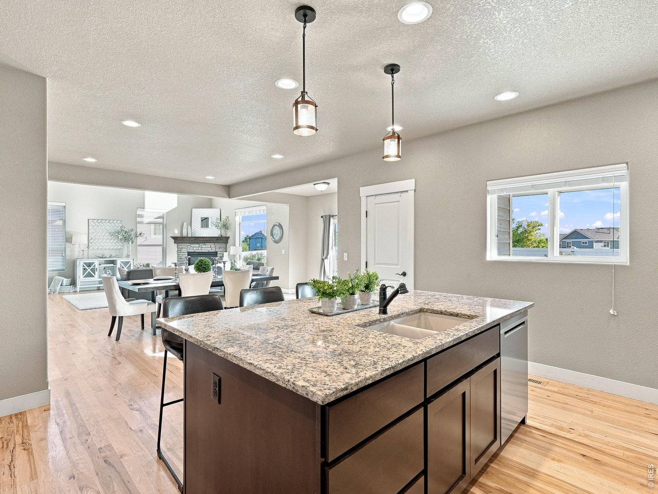 Property Photo 15 Oversized island with additional cabinet storage and plenty of prep space.