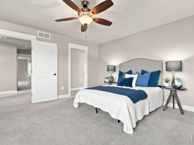 Property Photo 21 Spacious primary suite offering a peaceful retreat.