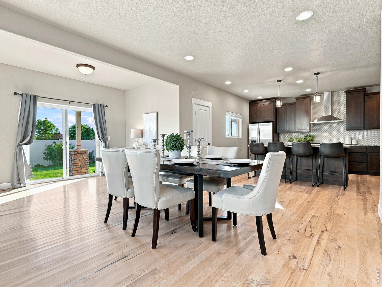 Property Photo 17 Bright eat-in dining area overlooking the backyard.