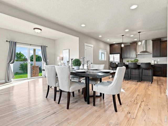 Property Photo 17 Bright eat-in dining area overlooking the backyard.