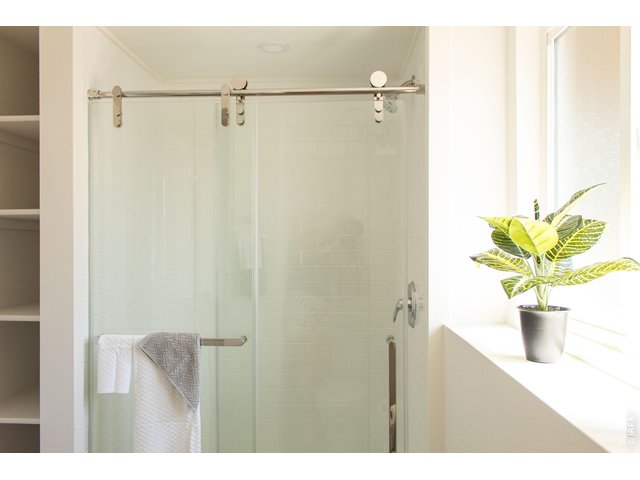 Property Photo 29 Spacious glass-enclosed shower.