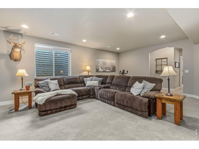 Property Photo 33 Spacious family room offers endless possibilities for recreation or movie nights.