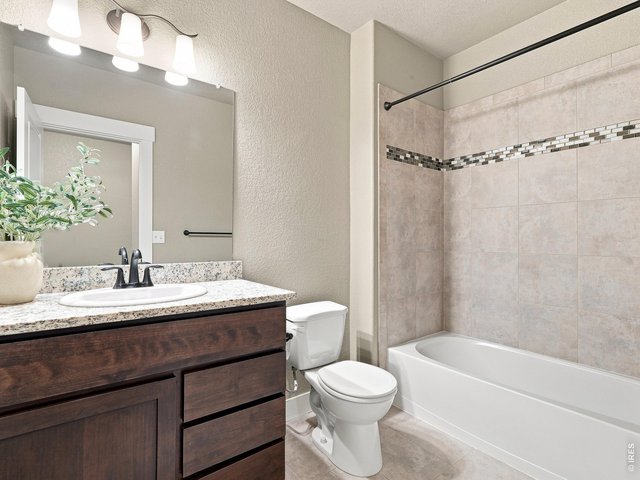 Property Photo 36 Full basement bathroom serves both lower-level bedrooms.