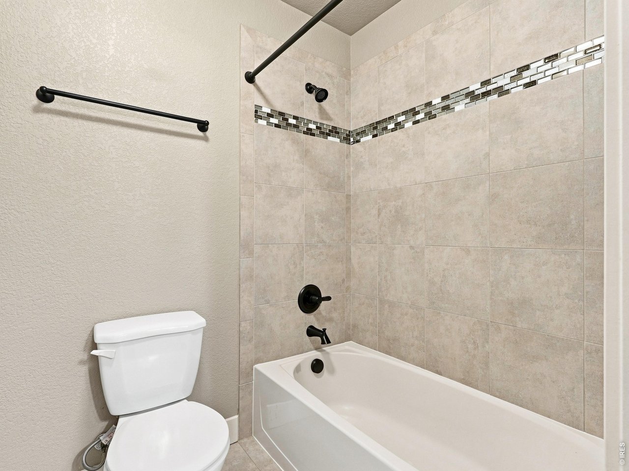 Property Photo 31 Separate shower and toilet area provides added privacy for busy mornings.