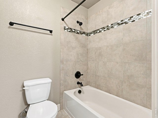 Property Photo 31 Separate shower and toilet area provides added privacy for busy mornings.