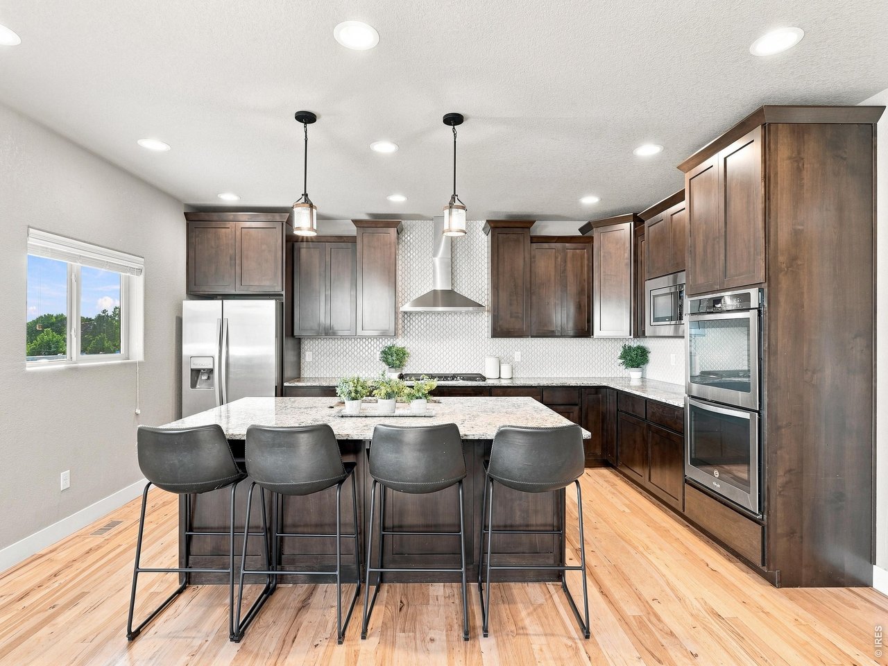 Property Photo 13 Beautiful "Cityscape" Tharp alder cabinetry with soft-close drawers and doors.