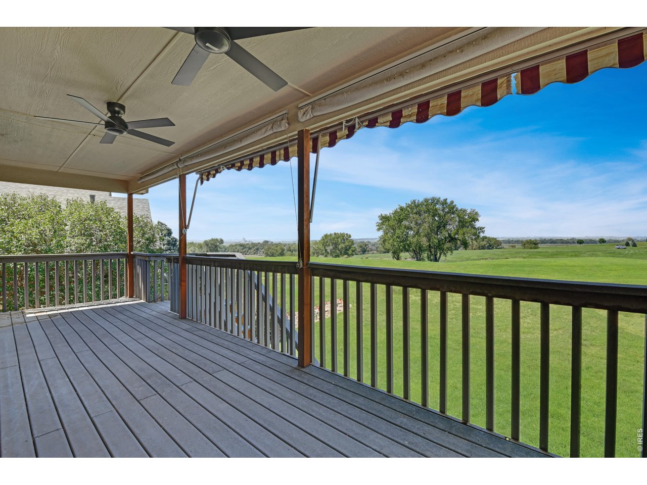 Property Photo 26 Covered deck with ceiling fans