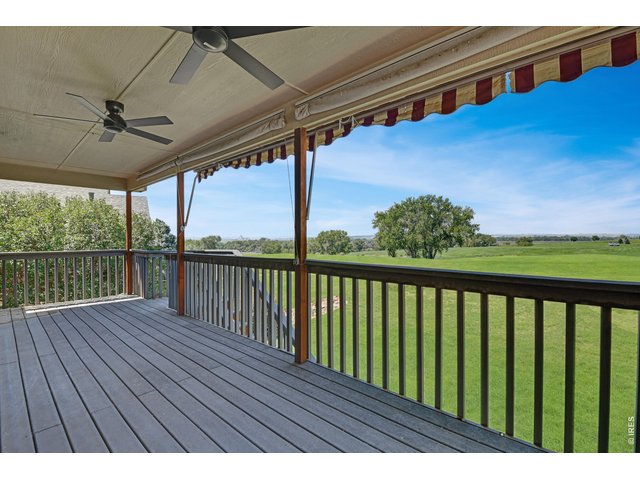 Property Photo 26 Covered deck with ceiling fans