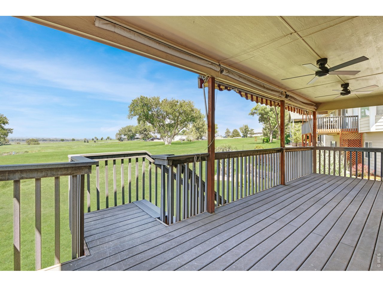 Property Photo 25 Deck withe stairs and views to North/west