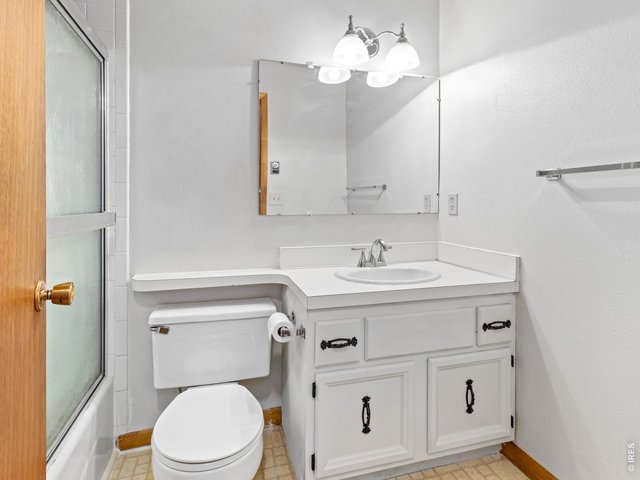 Property Photo 10 Unit 1: Full bathroom
