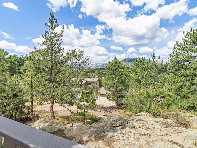 Property Photo 32 Enjoy the mountain views, abundant pines and rock outcroppings