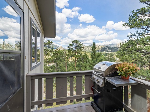 Property Photo 33 Unit 4: Upper level, private deck has mountain views, 2 bedrooms / 1 bathroom