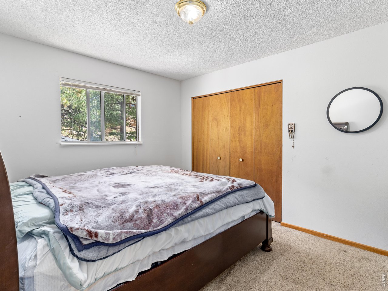 Property Photo 38 Unit 4: Bedroom 1 of 2