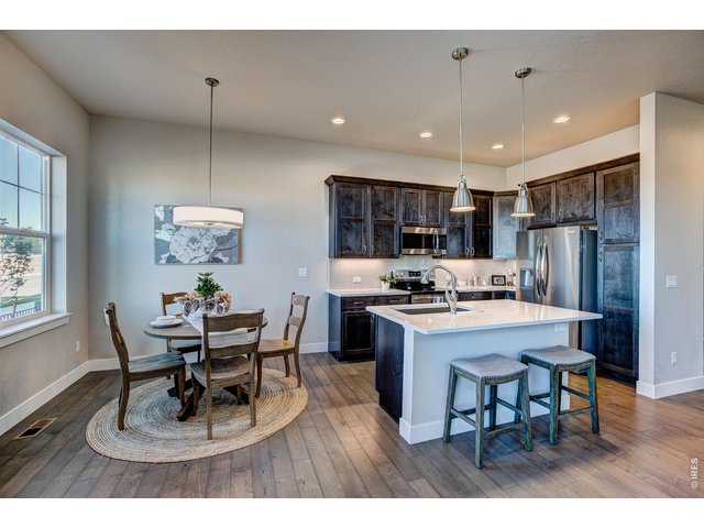 Property Photo 10 Timeless kitchen with large island and dining nook