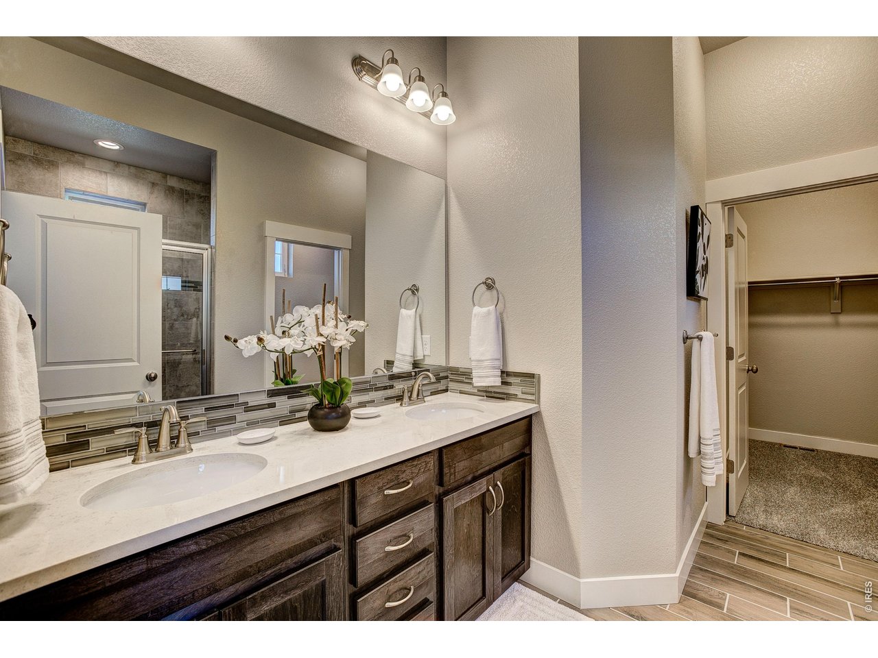 Property Photo 18 Primary bathroom w/ dual vanities