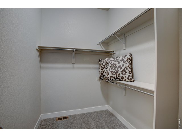 Property Photo 22 Primary walk-in closet