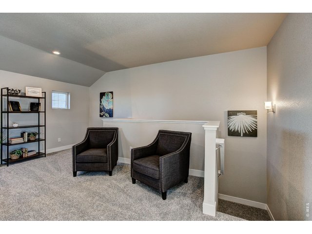 Property Photo 25 Upstairs loft area perfect for home office, reading nook, gaming or fitness area.