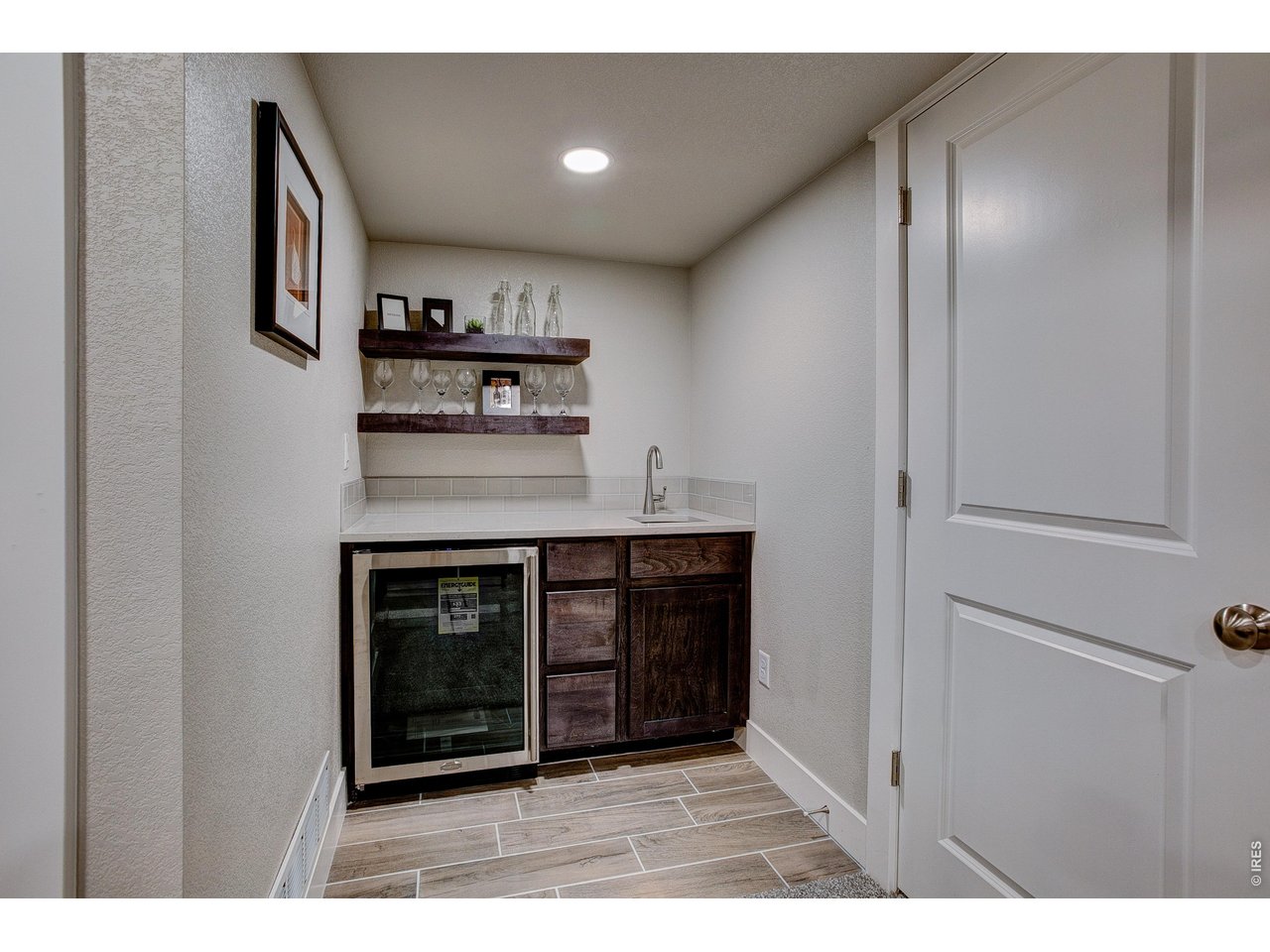 Property Photo 37 Built-in wet bar with sink & beverage cooler included
