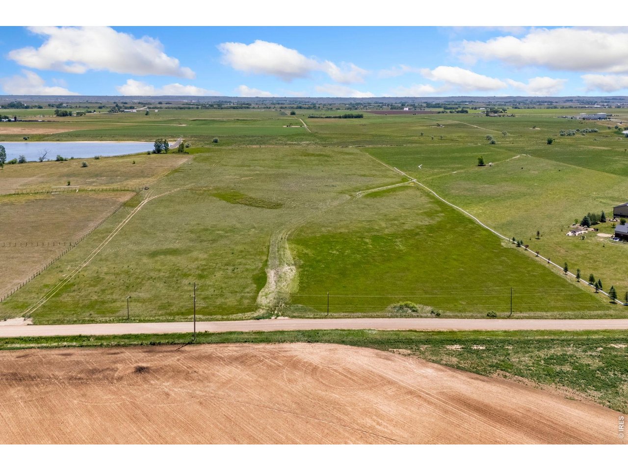 Property Photo 9 The property also borders Wasson Reservoir along its northeast side and is located less than half a mile from North Poudre Reservoir #3, adding to the recreational and scenic appeal of the setting.
