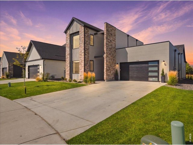Property Photo 1 Welcome home to this stunning Trumark "Huntington" floor plan in sought-after Pelican Shores.